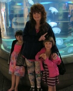 Kayla, right, me, center, Kylie, left. Viewing jelly fish at the Aquarium